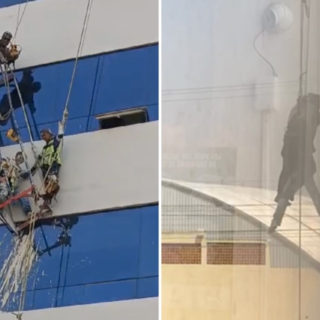 Trabajadores quedan atrapados en andamio a 30 metros de altura en Puebla.