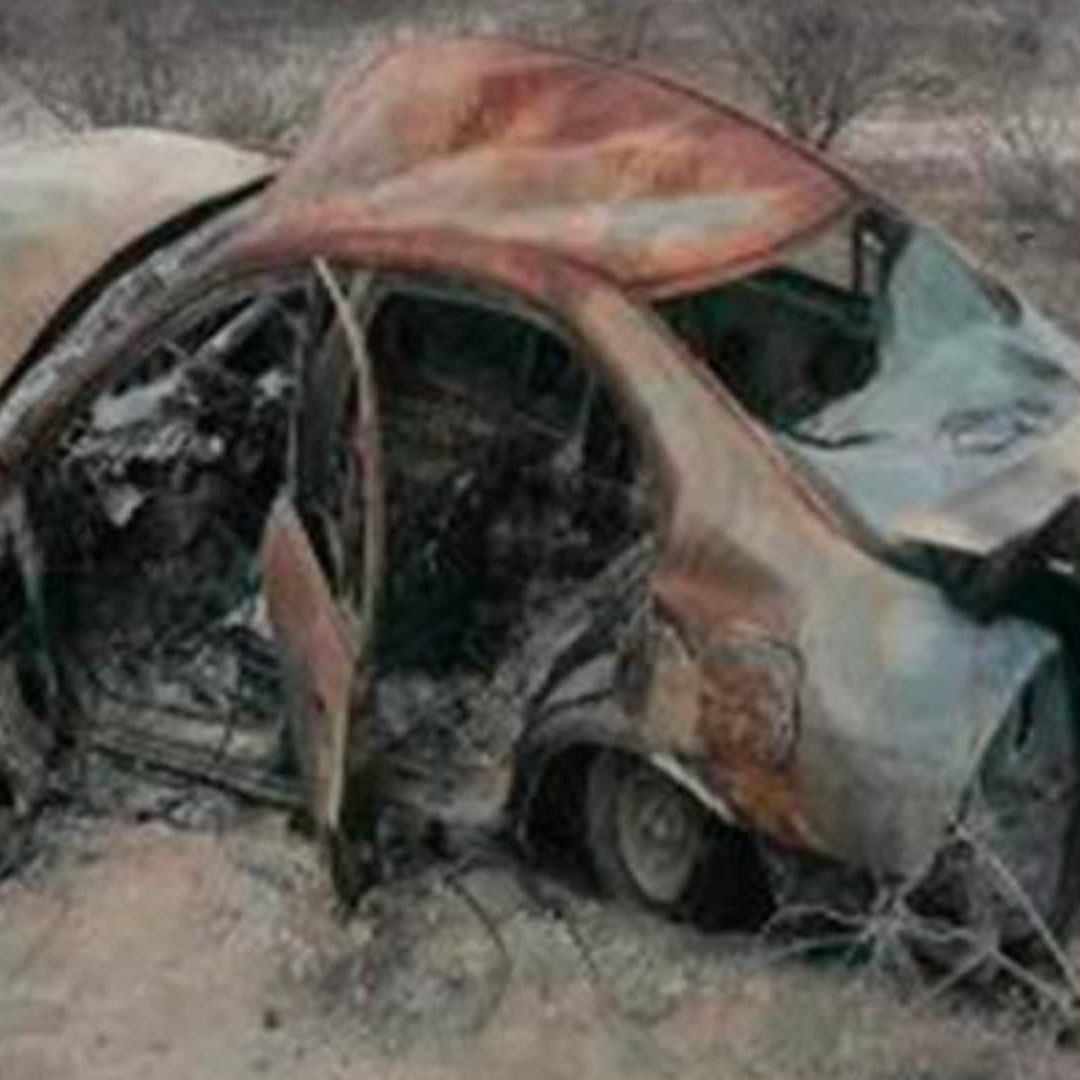 Carro Completamente Quemado con Restos Humanos