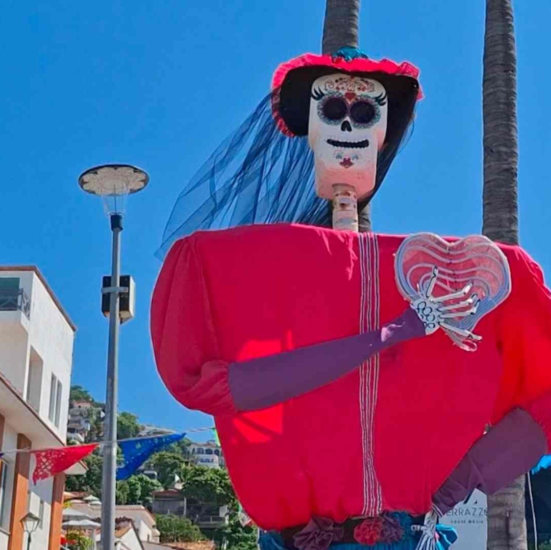 La Catrina está acompañada de su mascota