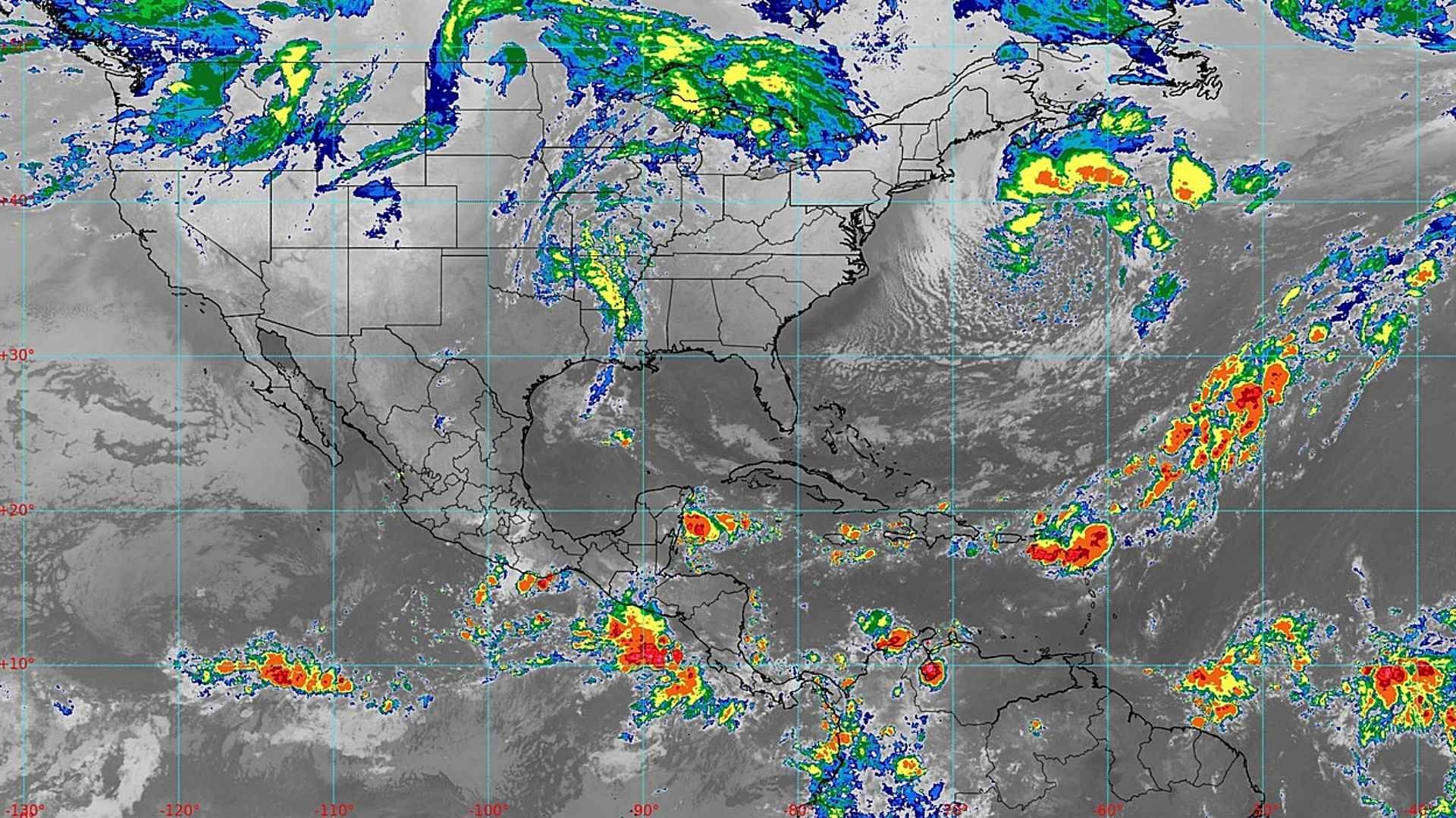 Imagen de satélite que muestra distintos fenómenos meteorológicos en el Pacífico y el Atlántico
