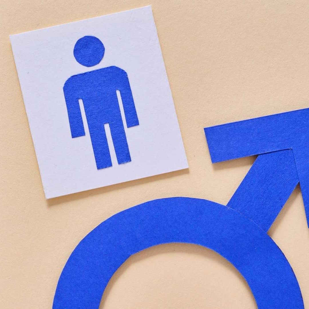 Male Symbol On Purple Background