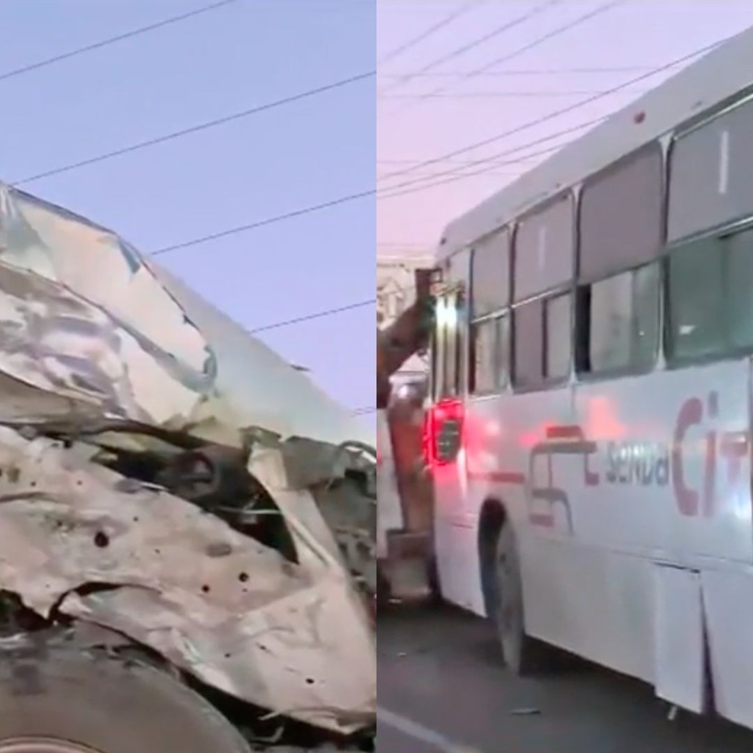 Auto destrozado y camión de transporte público retirados con grúa