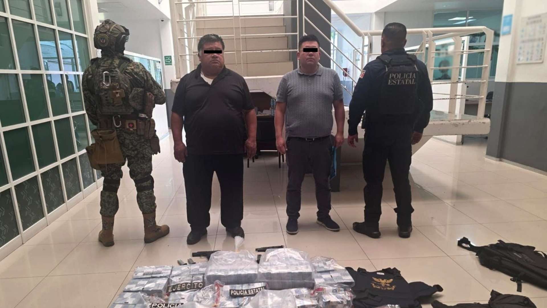 Sujetos detenidos con 37 millones de pesos en Naucalpan.