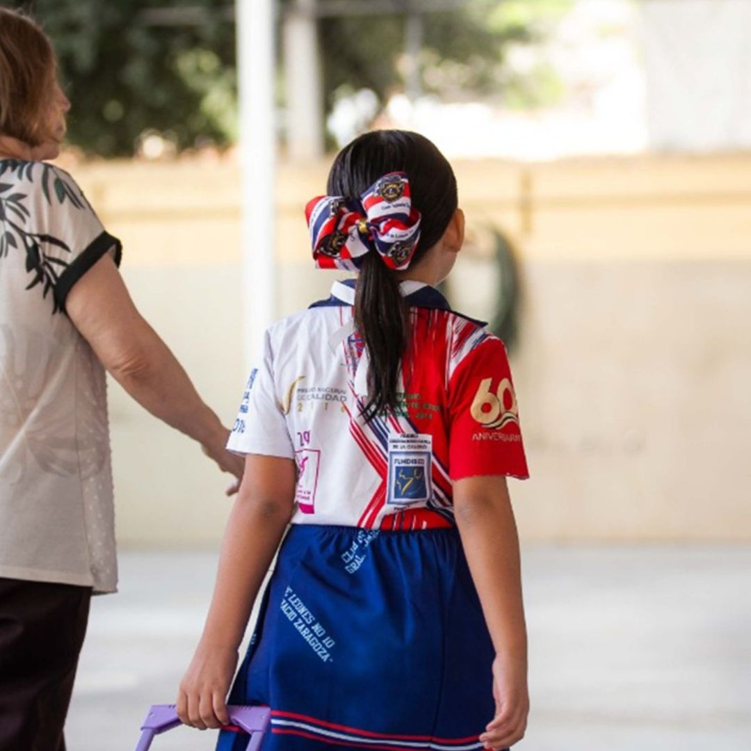 Alumna regresa a clases