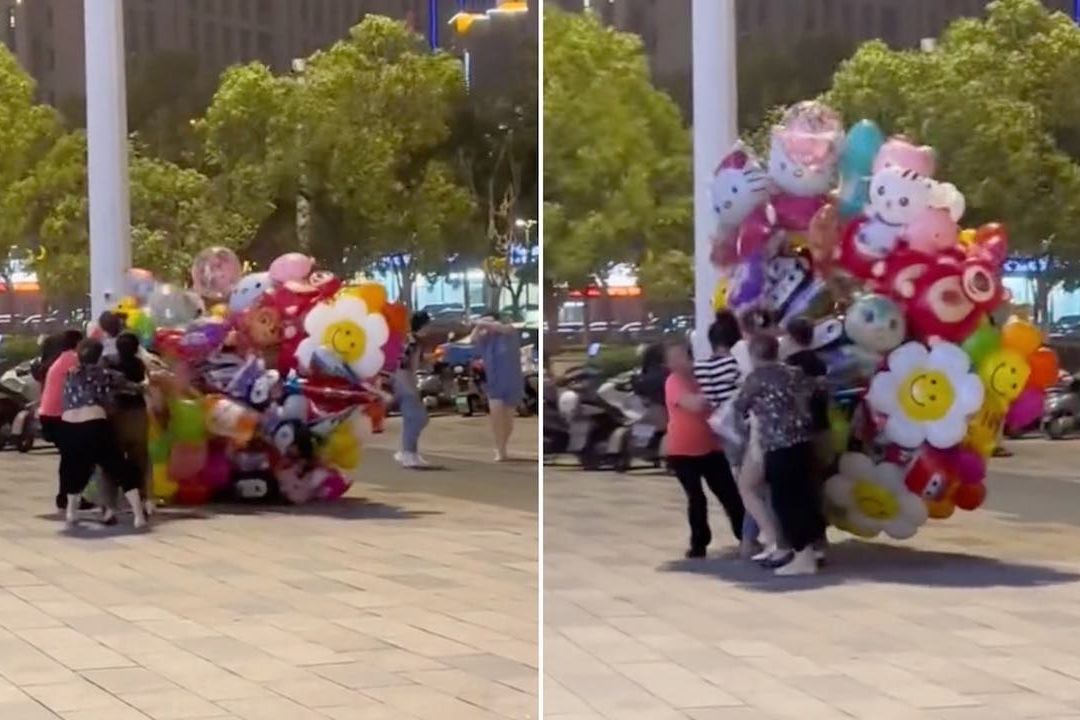 Mujer pierde sus globos por culpa del viento