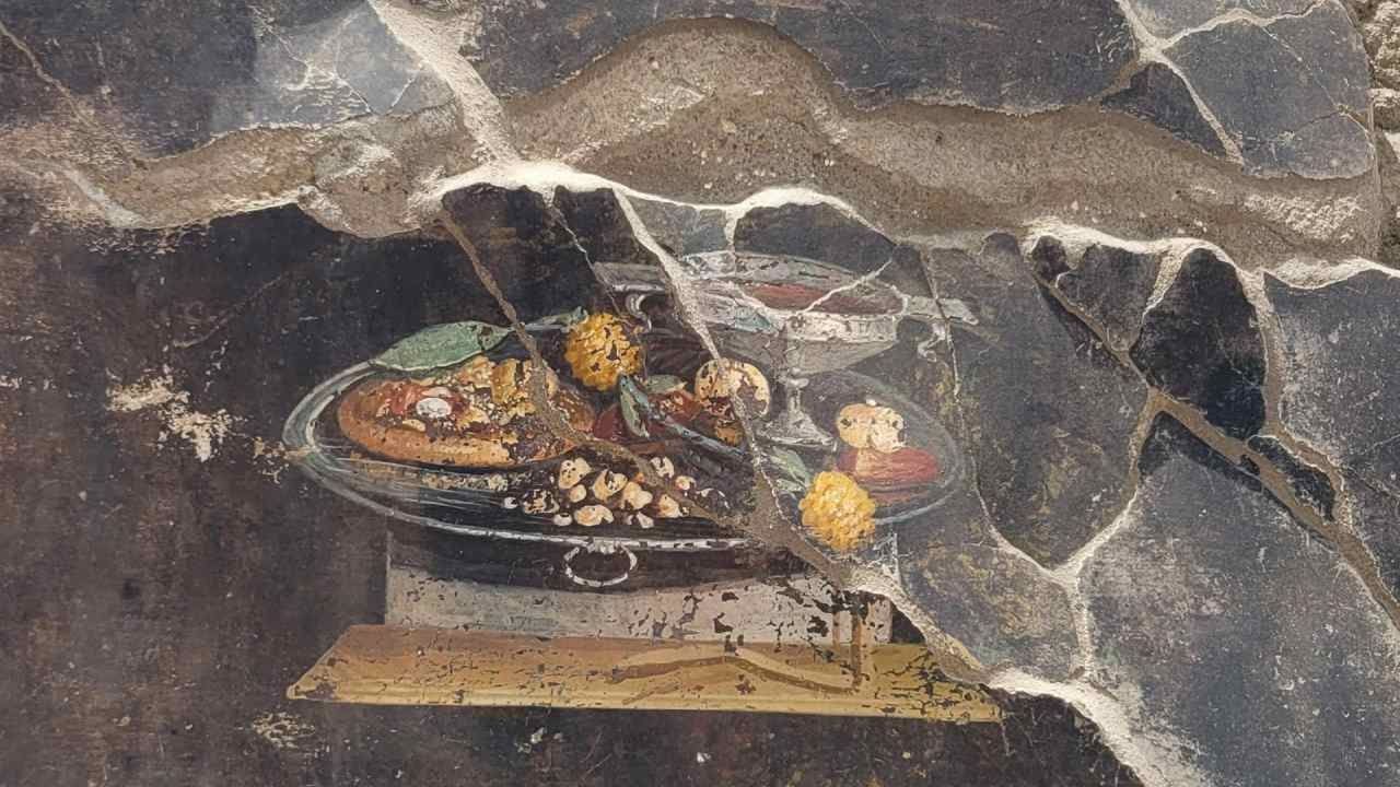 Descubren Posible Antepasado de la Pizza en un Fresco en Pompeya