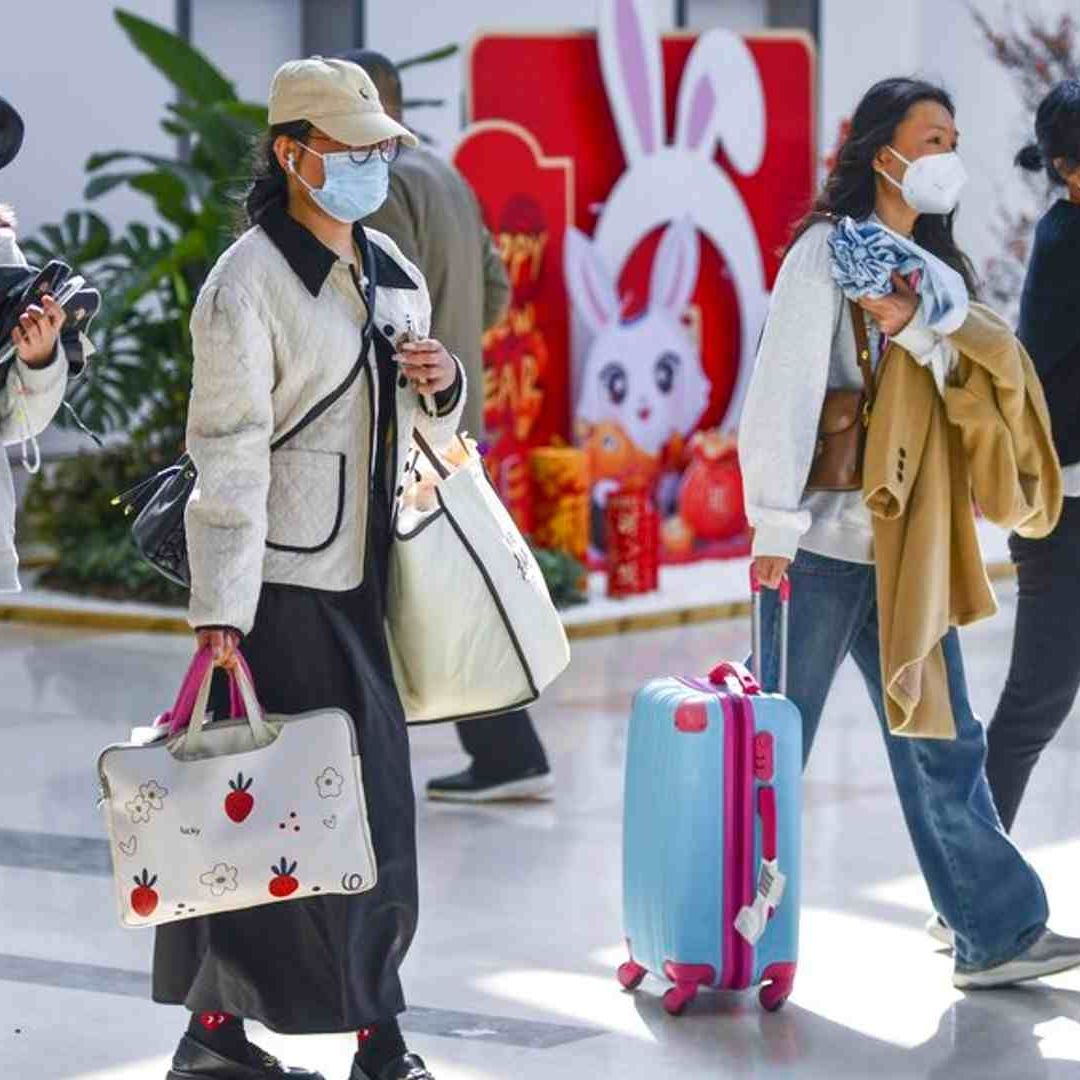 Viajeros en el Aeropuerto Internacional Haikou Meilan, ciudad de Haikou