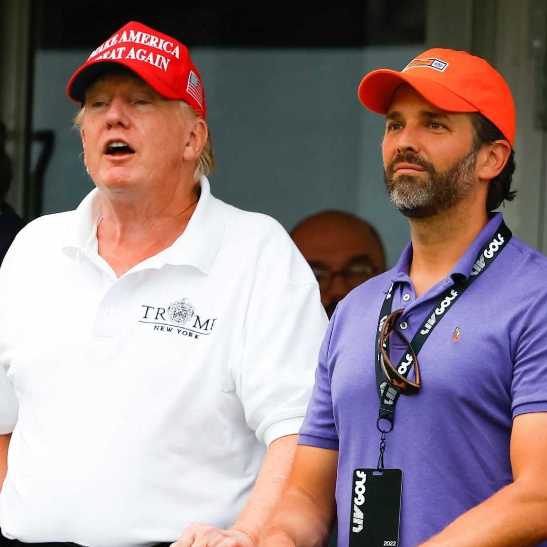 Donald Trump y su hijo, durante un torneo de golf en Nueva Jersey