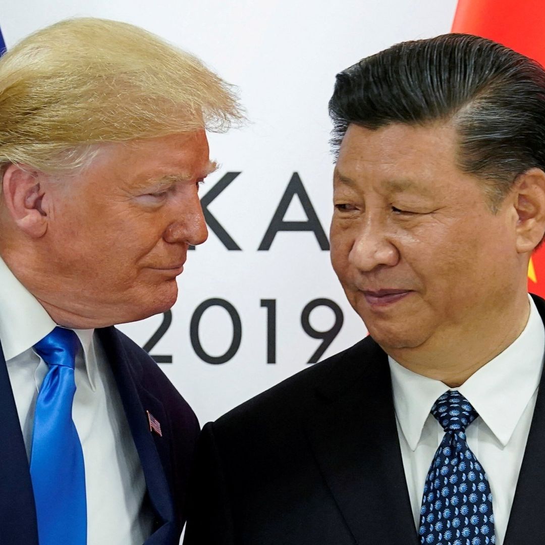 Donald Trump junto a Xi Jinping