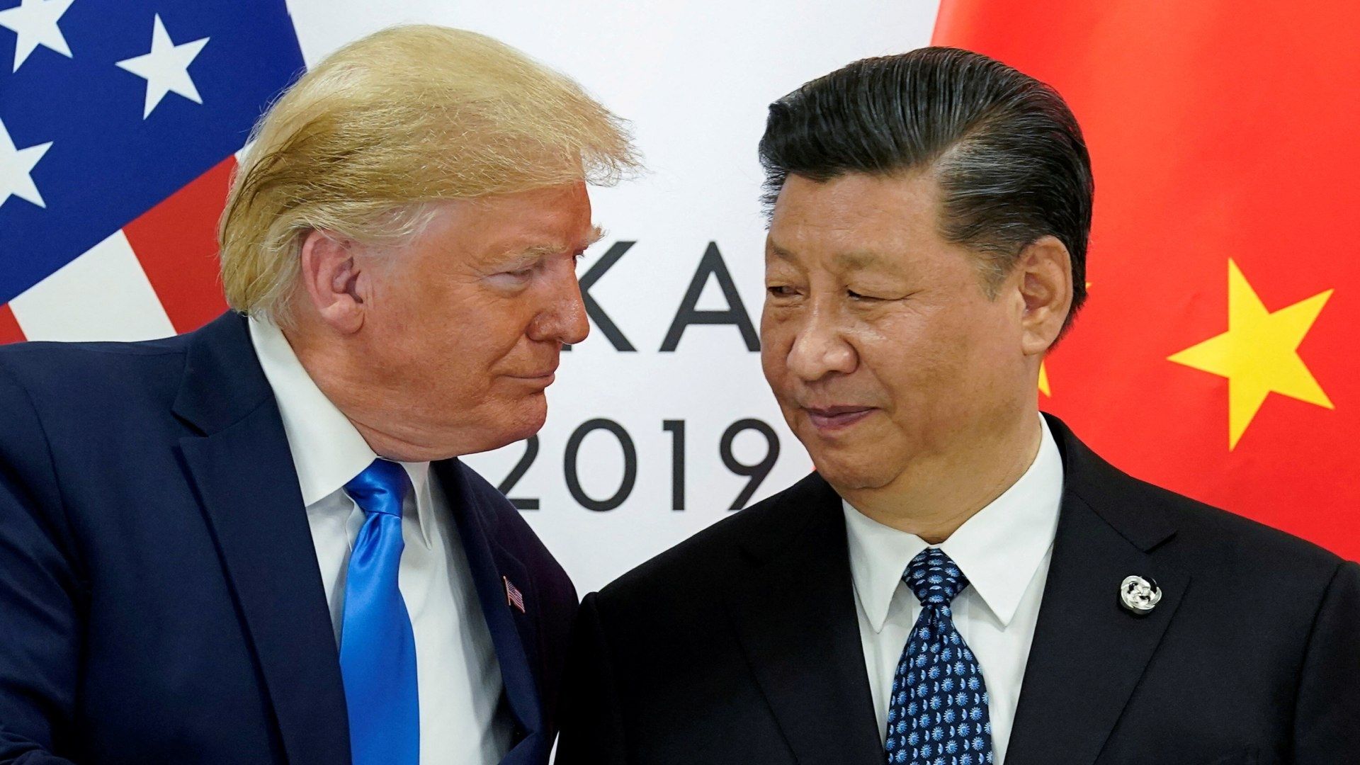 Donald Trump junto a Xi Jinping