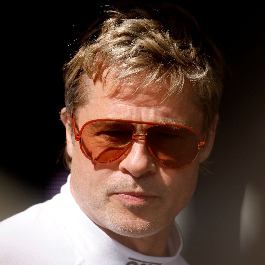 Brad Pitt roba cámara a Checo Pérez