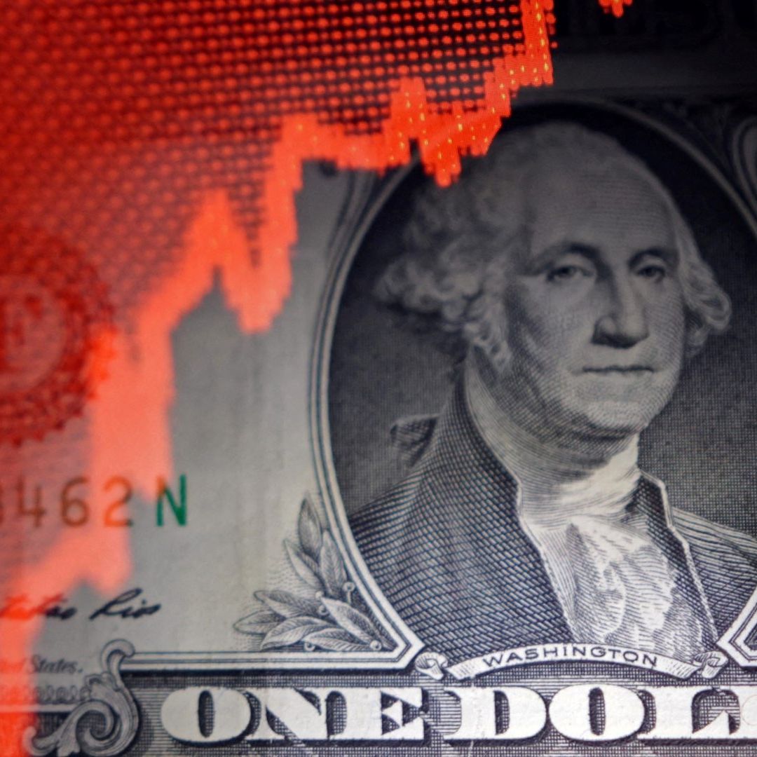 Billete de un dólar de Estados Unidos con gráfica roja