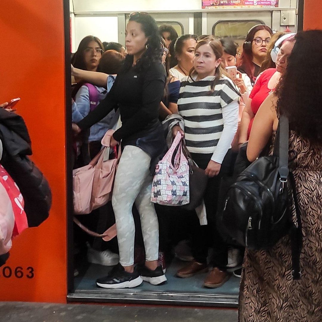 personas en el Metro