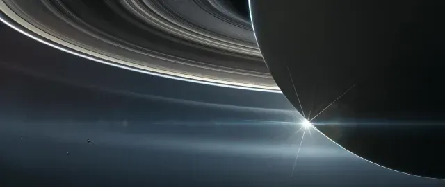Ilustración de la sonda Cassini acercándose a los anillos de Saturno