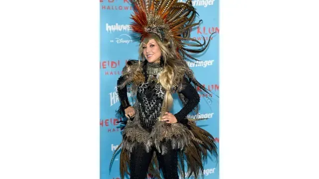 Fey utilizó un disfraz de plumas para ser parte de la fiesta de Heidi Klum.