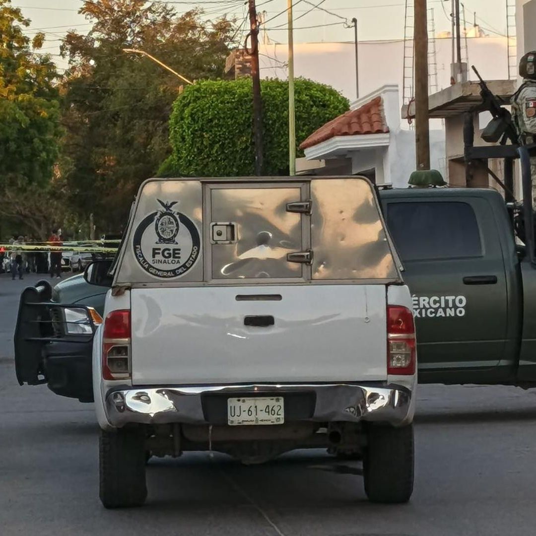Mujer asesinada en auto
