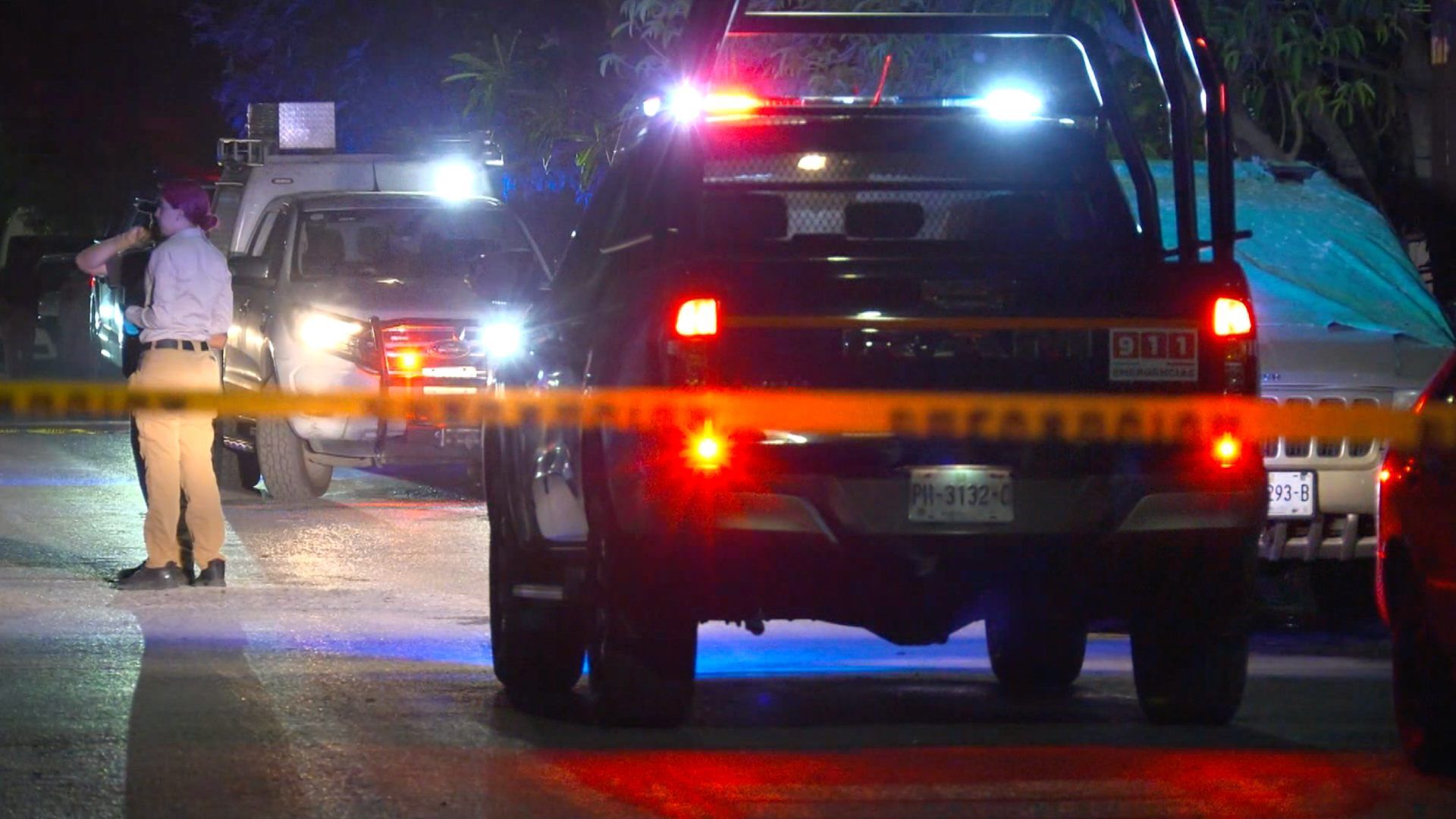 Patrulla de la Policía de Juárez y zona acordonada por homicidio