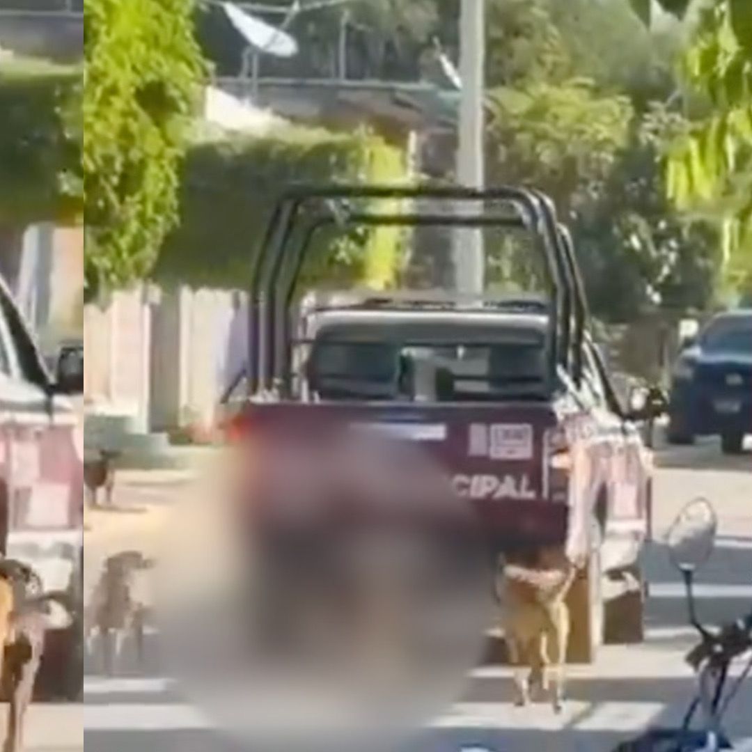 Captan a patrulla municipal de Puebla arrastrando a un perro.