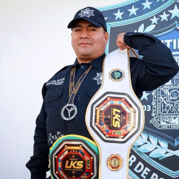 Gerardo Alfonso Germán de los Santos policía auxiliar y campeón en artes marciales.