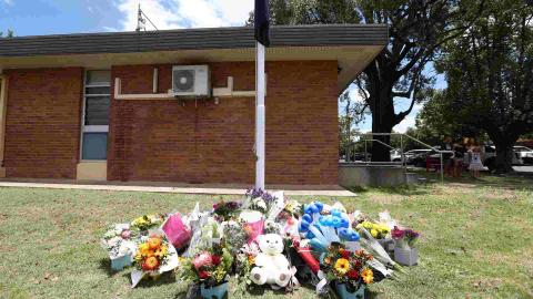Vecinos rinden homenaje a policías caídos en Australia